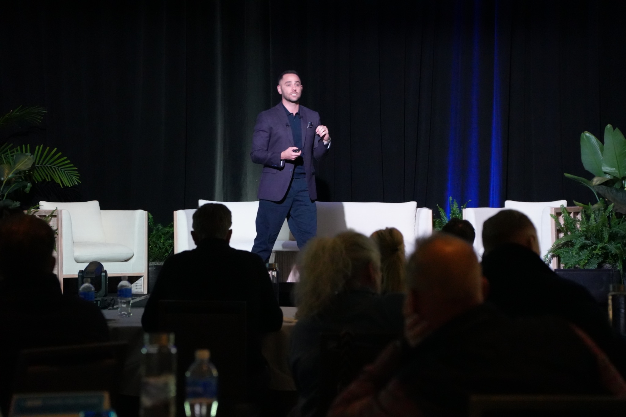 Marc Nudelberg presenting on stage